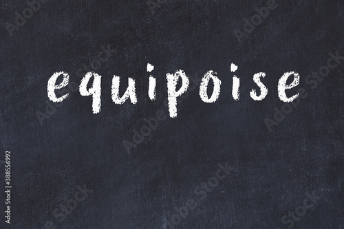 College chalk desk with the word equipoise written on in