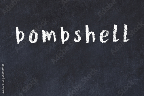 Fotografie College chalk desk with the word bombshell written on in