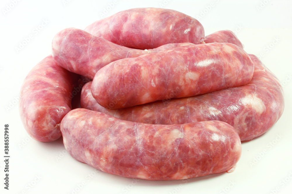 pile of fresh raw pork meat sausage isolated on white background pile of fresh raw pork meat sausage isolated on white background