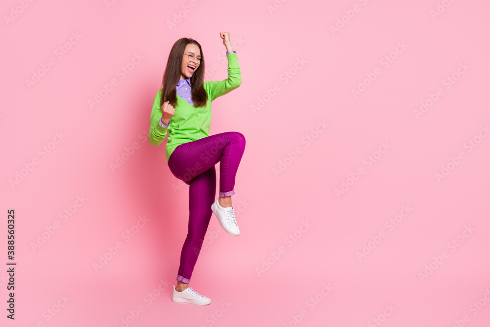 Full size photo of ecstatic girl win raise fists scream isolated over pink color background