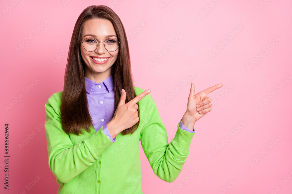 Portrait of positive girl point index finger copyspace wear good look outfit isolated over pastel color background Portrait of positive girl point index finger copyspace wear good look outfit isolated over pastel color background