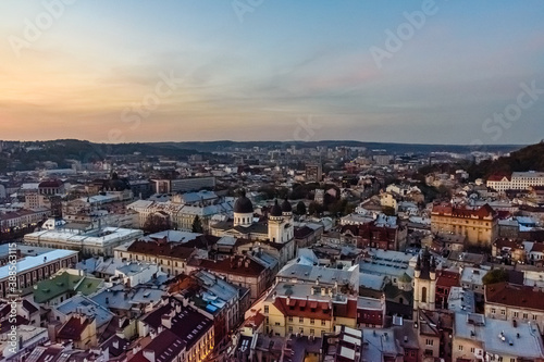 Fototapeta Naklejka Na Ścianę i Meble -  View on historic center of the Lviv at sunset. View on Lvov cityscape from the town hall