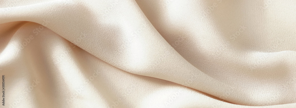 Beige silk texture background . Beautiful soft crumpled silk fabric wedding backdrop. copy space Beige silk texture background . Beautiful soft crumpled silk fabric wedding backdrop. copy space