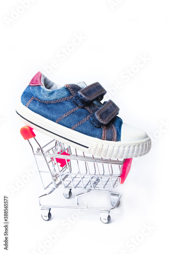 stylish ply basket store with shoes on a white background © Kostia