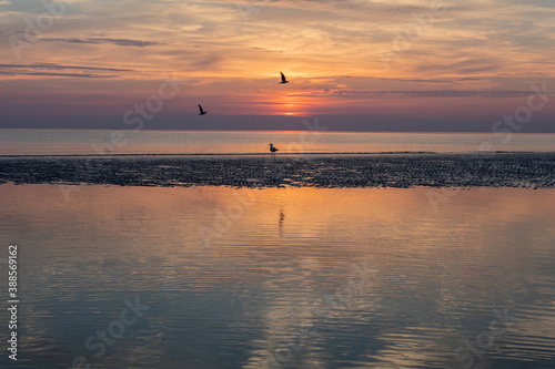 Schilderij op canvas Stunning sunset at the North Sea