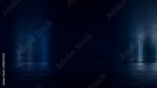 Dark street, wet asphalt, reflections of rays in the water. Abstract dark blue background, smoke, smog. Empty dark scene, neon light, spotlights. Concrete floor © MiaStendal