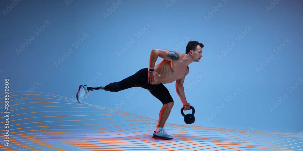Athlete with disabilities or amputee training with weight isolated on blue studio background. Neoned modern artwork, cover, flyer designed. Disabled sport and overcoming, wellness concept.