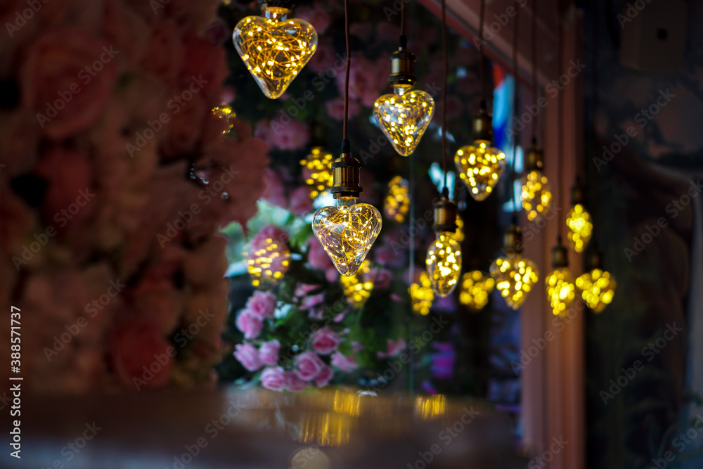 Heart shaped light bulb And beautiful lights