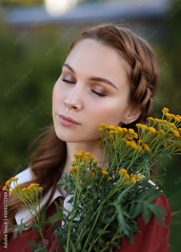 Portrait of a beautiful young woman with flowers in retro style Portrait of a beautiful young woman with flowers in retro style