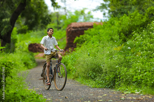 indian little boy enjoy cycle riding