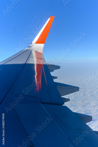 Evening shadow on the wing of an airplane