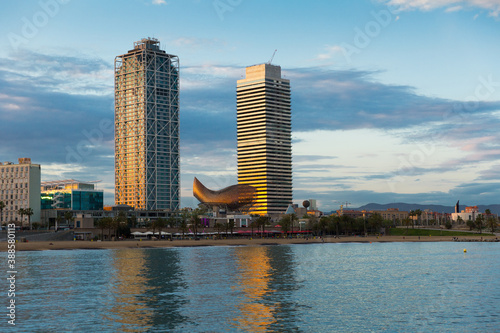 Barcelona cityscape with skyscrapers on Mediterranean coastline photo