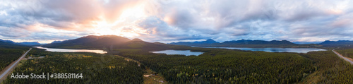 Panoramic View of Scenic Lakes surrounded my Mountains and Forest at Sunset in Canadian Nature. Aerial Drone Shot. Yukon, Canada. © edb3_16