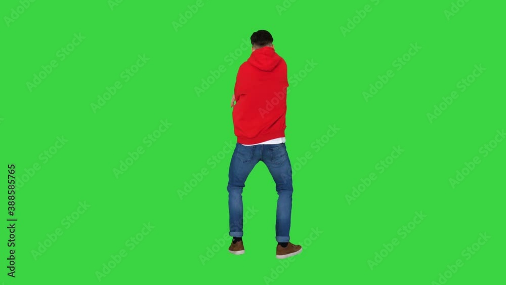 Young man dancing hip-hop doing waves on a Green Screen, Chroma Key. Young man dancing hip-hop doing waves on a Green Screen, Chroma Key.