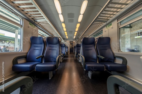 View of the interior of a train with empty seats