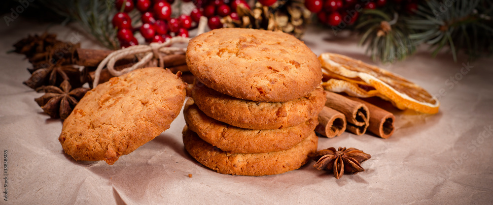 cookies with chocolate on a wooden background with Christmas tree branches and decorations cookies with chocolate on a wooden background with Christmas tree branches and decorations
