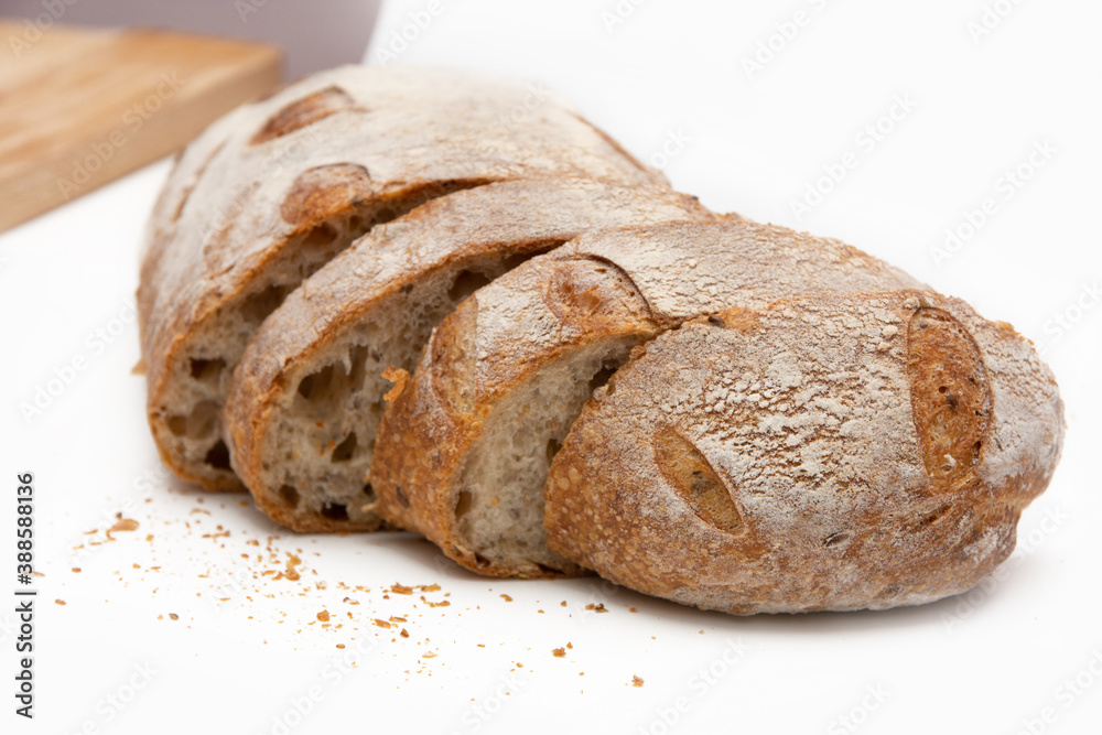 Sliced rye bread on a white background