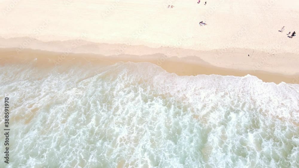 Tourists At The Beach With Ocean Waves In Summer - Palm Beach In Gold Coast, QLD, Australia. - aerial descend forward Tourists At The Beach With Ocean Waves In Summer - Palm Beach In Gold Coast, QLD, Australia. - aerial descend forward