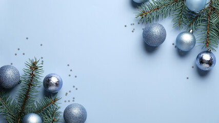 Blue Christmas background with pine tree branches decorated balls on blue background. Xmas frame border, banner mockup, greeting card template