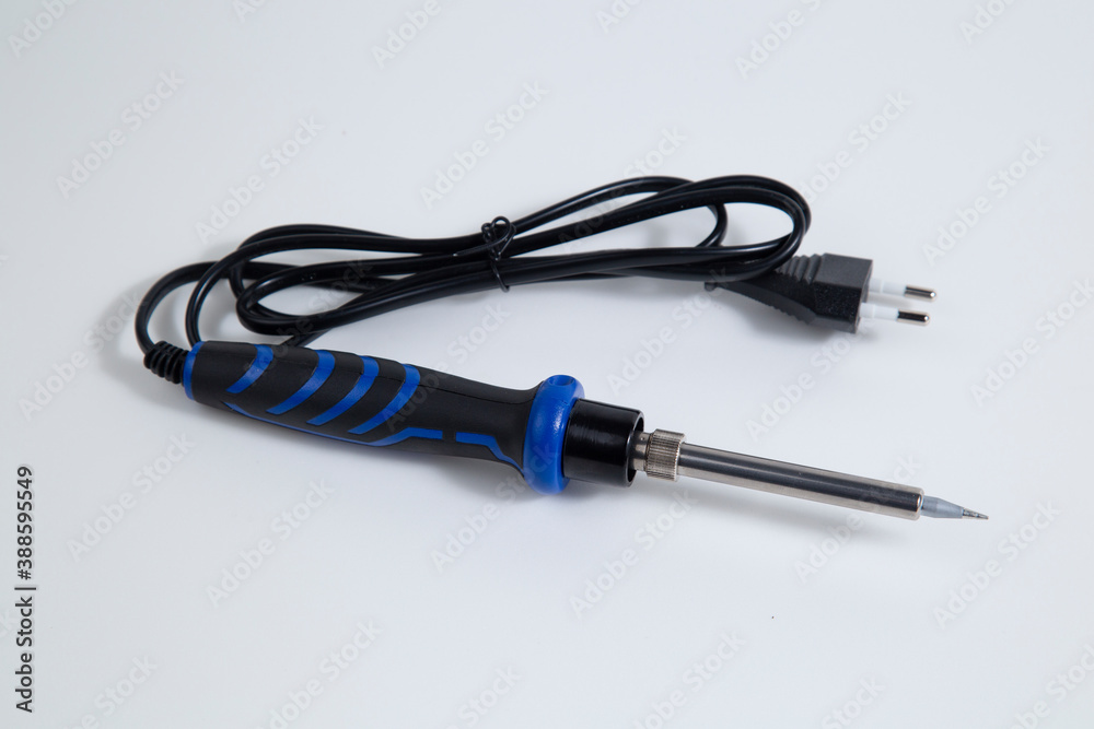 Soldering iron for electronic boards. A tool for repairing electronic components. Soldering iron for electronic boards. A tool for repairing electronic components.