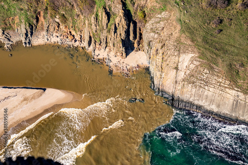 River Veleka delta. Tandem motor paragliding over Black Sea shores near town of Ahtopol. Sunny autumn day, scenery colors and amazing landscapes and seascapes, Bulgaria photo