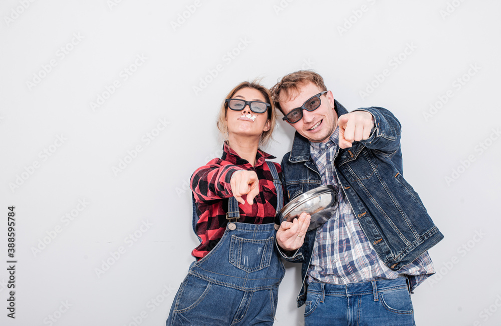 Couple watching TV and eating popcorn. Couple in love. Tv. Popcorn. Fun. Crazy photo. Emotion.
Couple watching TV and eating popcorn. Couple in love. Tv. Popcorn. Fun. Crazy photo. Emotion.