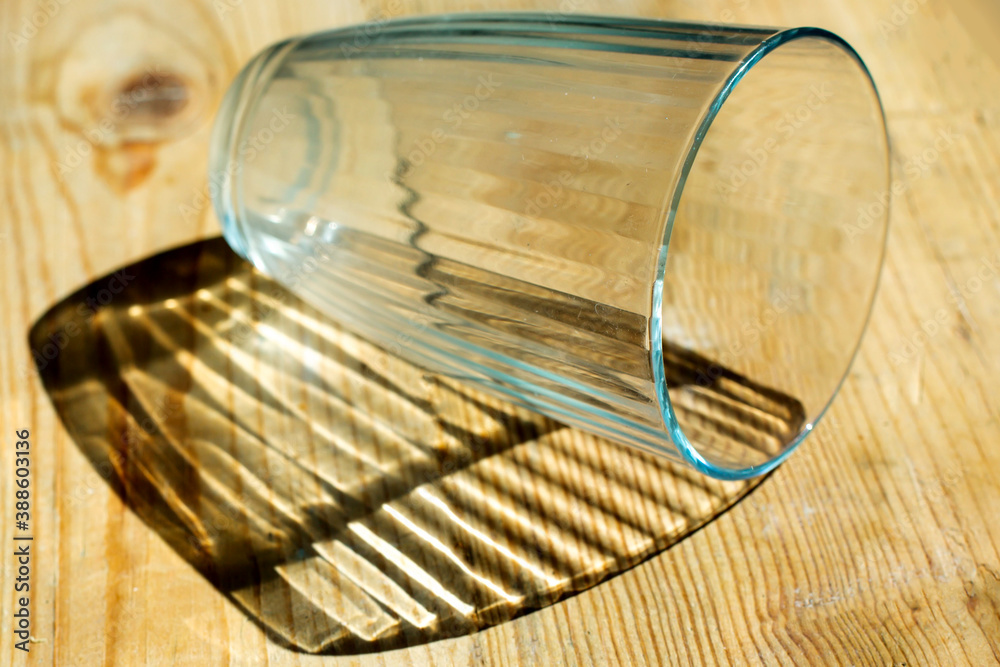 Fototapeta premium glass goblet on wood background