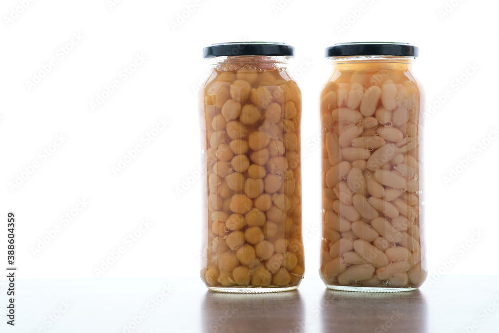 Beans and chickpeas inside glass jars Beans and chickpeas inside glass jars