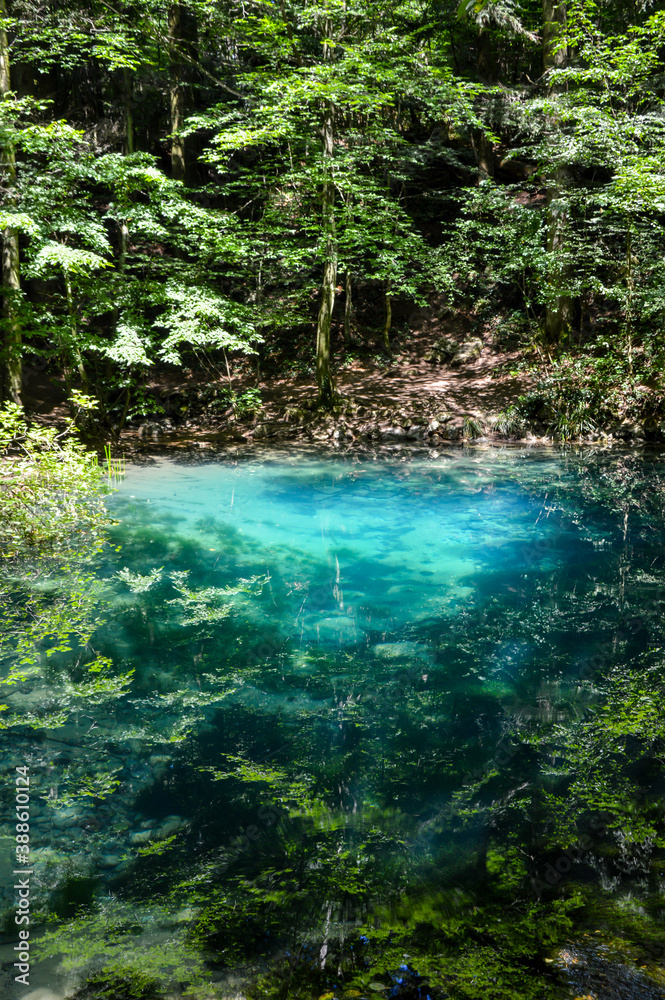Naklejka premium Aqua Blue lake in Romania, Lake Ochiul Beiului