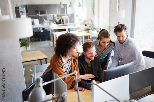 Software engineers working on project and programming in company