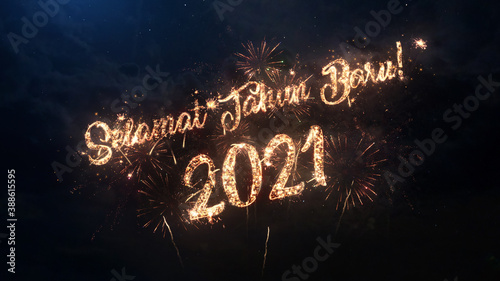 2021 Happy New Year greeting text in Indonesian with particles and sparks on black night sky with colored fireworks on background, beautiful typography magic design.