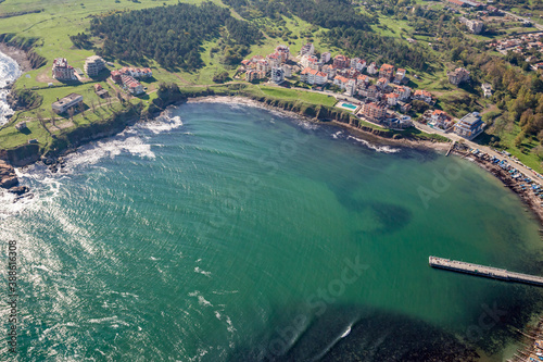 Town of Ahtopol from high above. Tandem motor paragliding over Black Sea shores near town of Ahtopol. Sunny autumn day, scenery colors and amazing landscapes and seascapes, Bulgaria