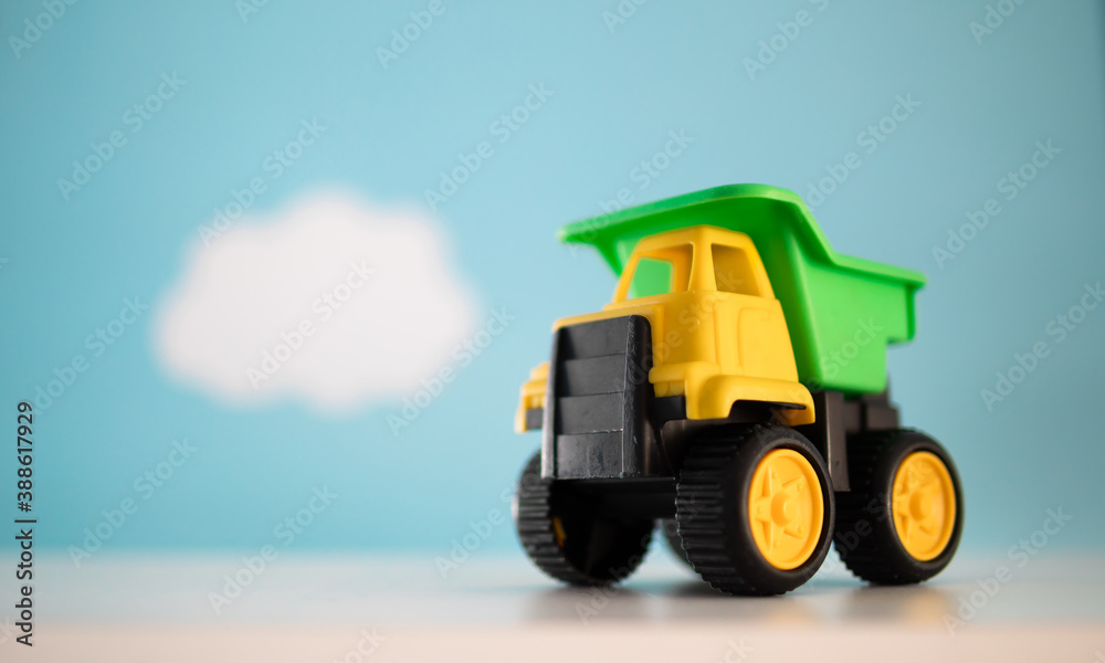 Obraz premium toy truck on a blue background