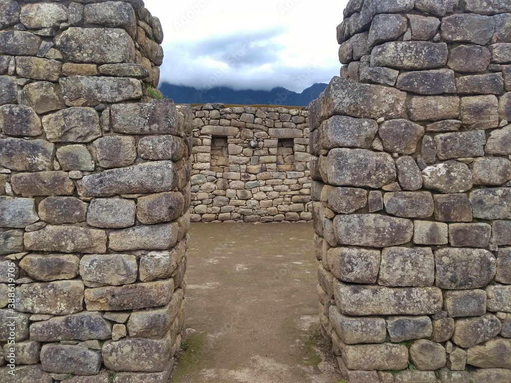 Ruins - Machu Picchu - The lost city of the Inca in Peru, South America. Set high in the Andes Mountains, is a UNESCO World Heritage Site and one of the New Seven Wonders of the World.