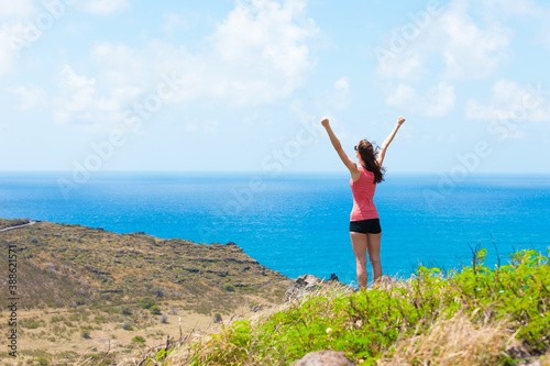 Young female feeling free in nature 