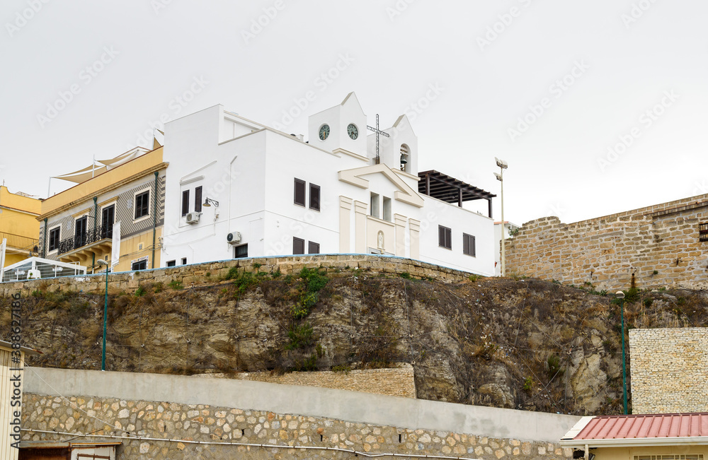 Small white church by the sea in Terrasini, province of Palermo, Sicily, Italy.