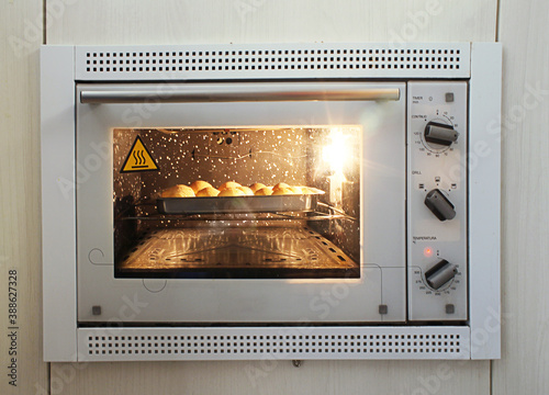 Cheese bread in the oven. Food Brazil.