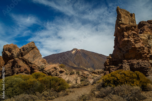 View of the peak of Mount Teide between two rock formations