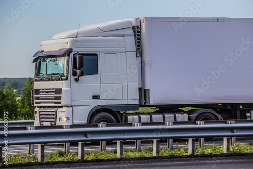 Wallpaper Mural Large White Truck Semi Trailer Drives On A Country Highway. Torontodigital.ca