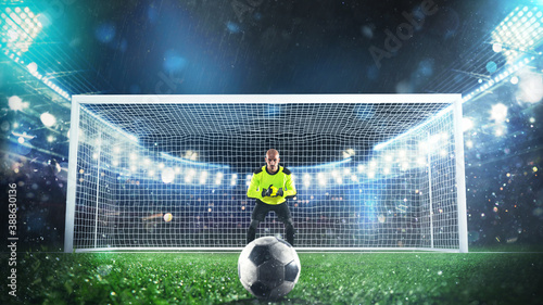 Foto Soccer goalie ready to save a penalty kick at the stadium