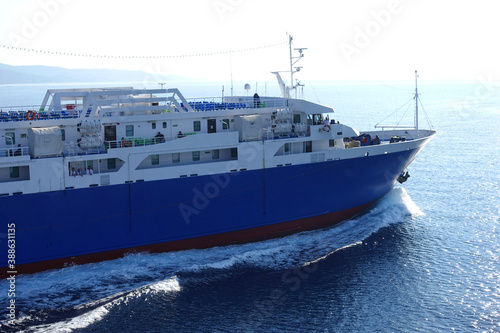 Passenger ferry reaching destination - busy port of Piraeus, Attica, Greece © aerial-drone