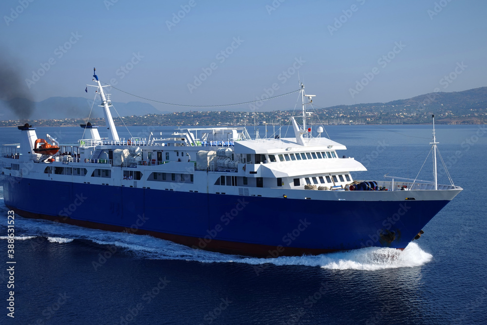 Passenger ferry reaching destination - busy port of Piraeus, Attica, Greece