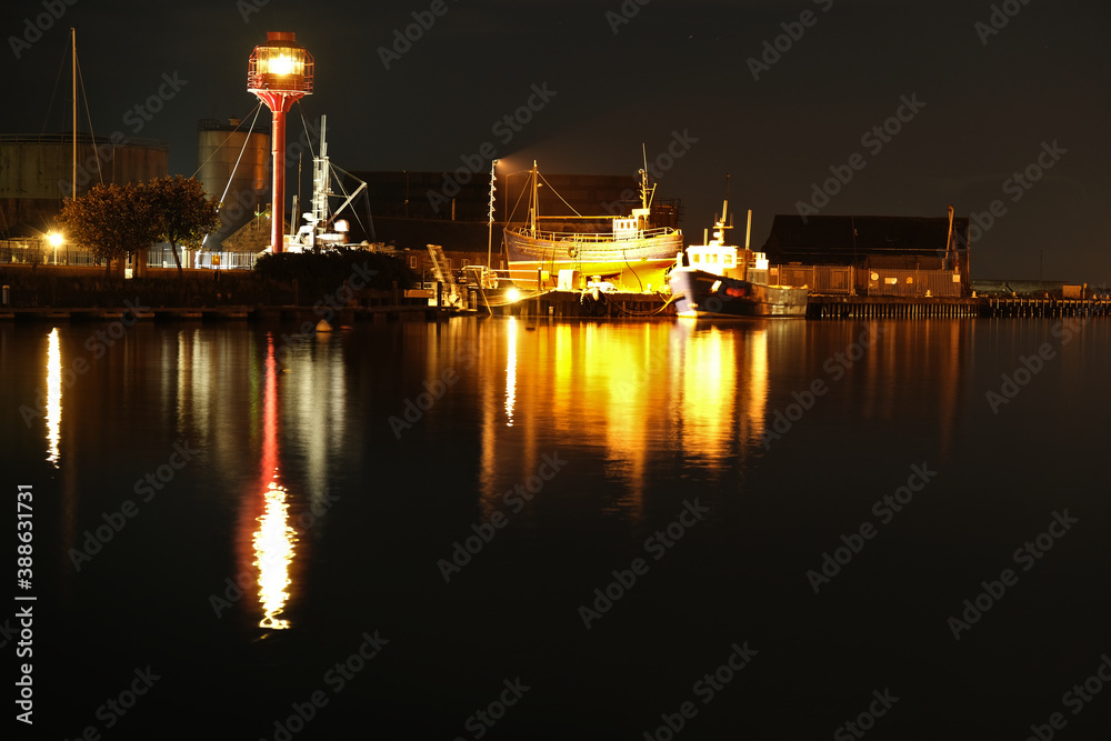 Albatross Light Tower in Arklow harbour with boats in behind
