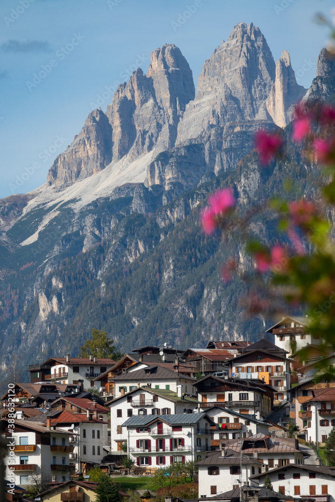 VERTICAL, CLOSE UP: Scenic shot of an idyllic small town under the Italian Alps.