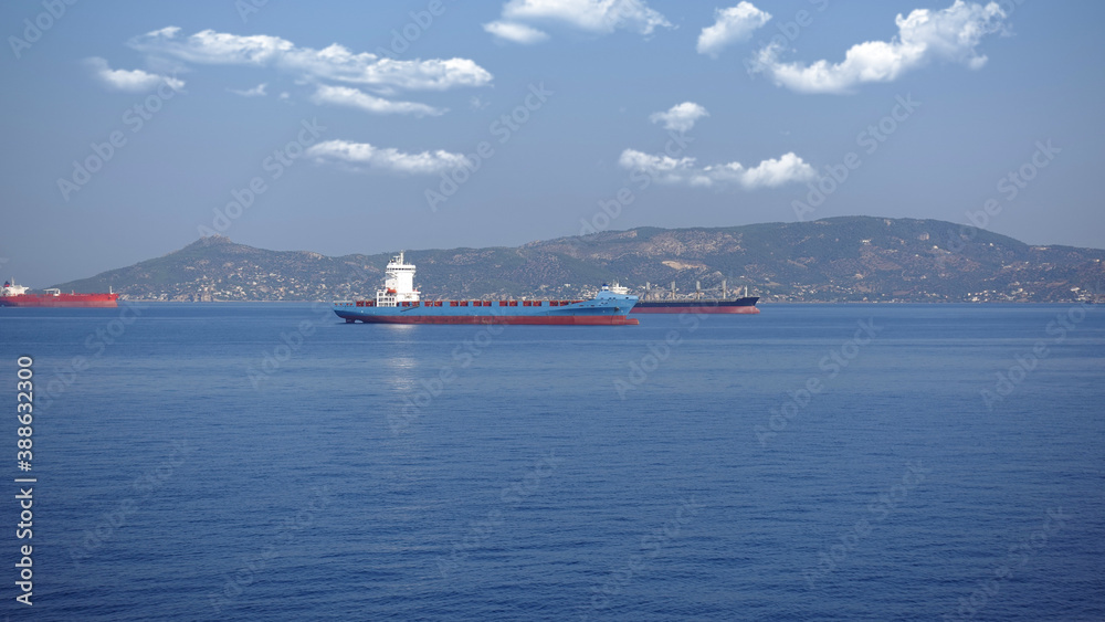 Zoom detail photo of industrial fuel and oil tanker ship anchored in Mediterranean deep blue sea