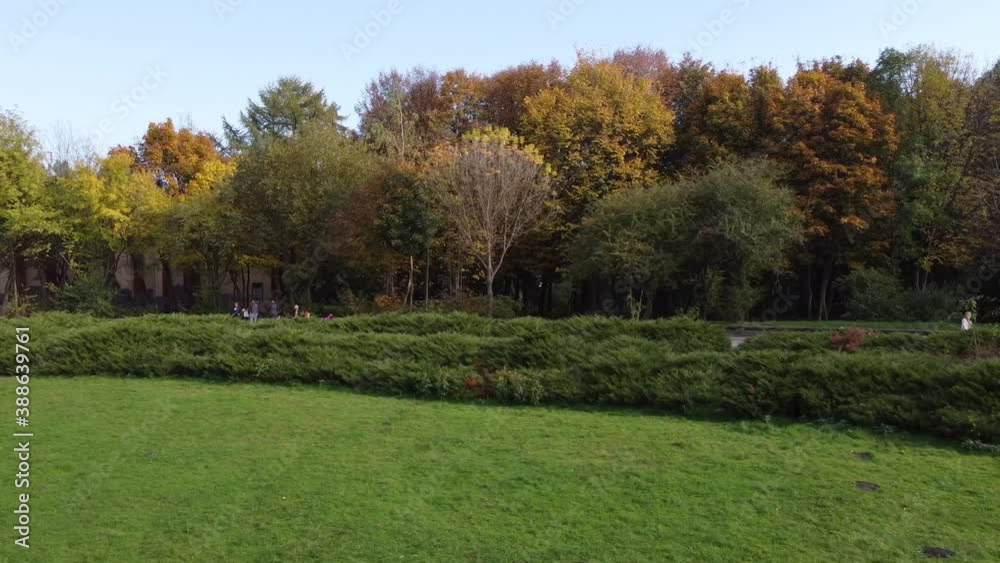 Aerial view of a drone flying over the park.
Aerial view of a drone flying over the park.