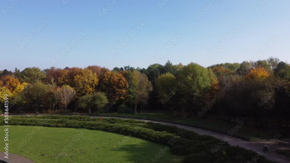 Aerial view of a drone flying over the park.
Aerial view of a drone flying over the park.