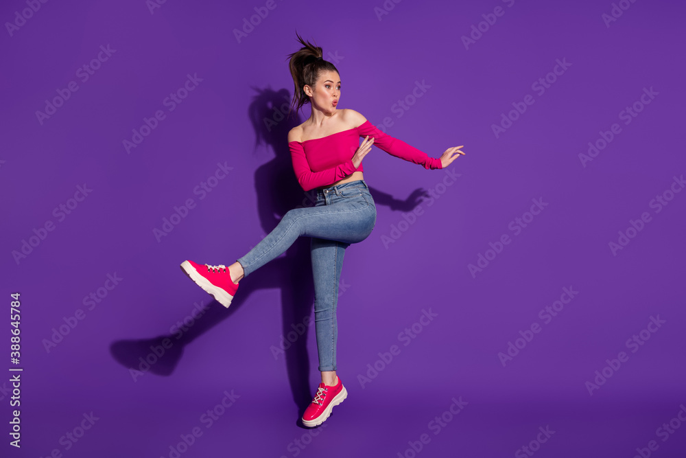 Full length body size view of lovely coquettish cheery girl having fun jumping pout lips isolated on bright violet color background