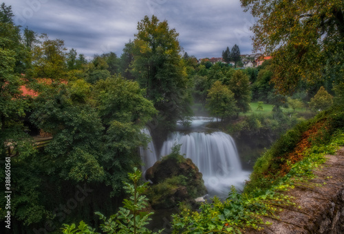 Waterfall Veliki Buk - Big Buk in green nature of Korana river  village of Rastoke  Slunj  Croatia. August 2020. Long exposure picture.