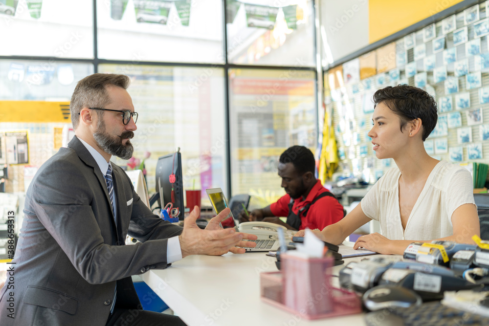 Business man talking face to face with customer service